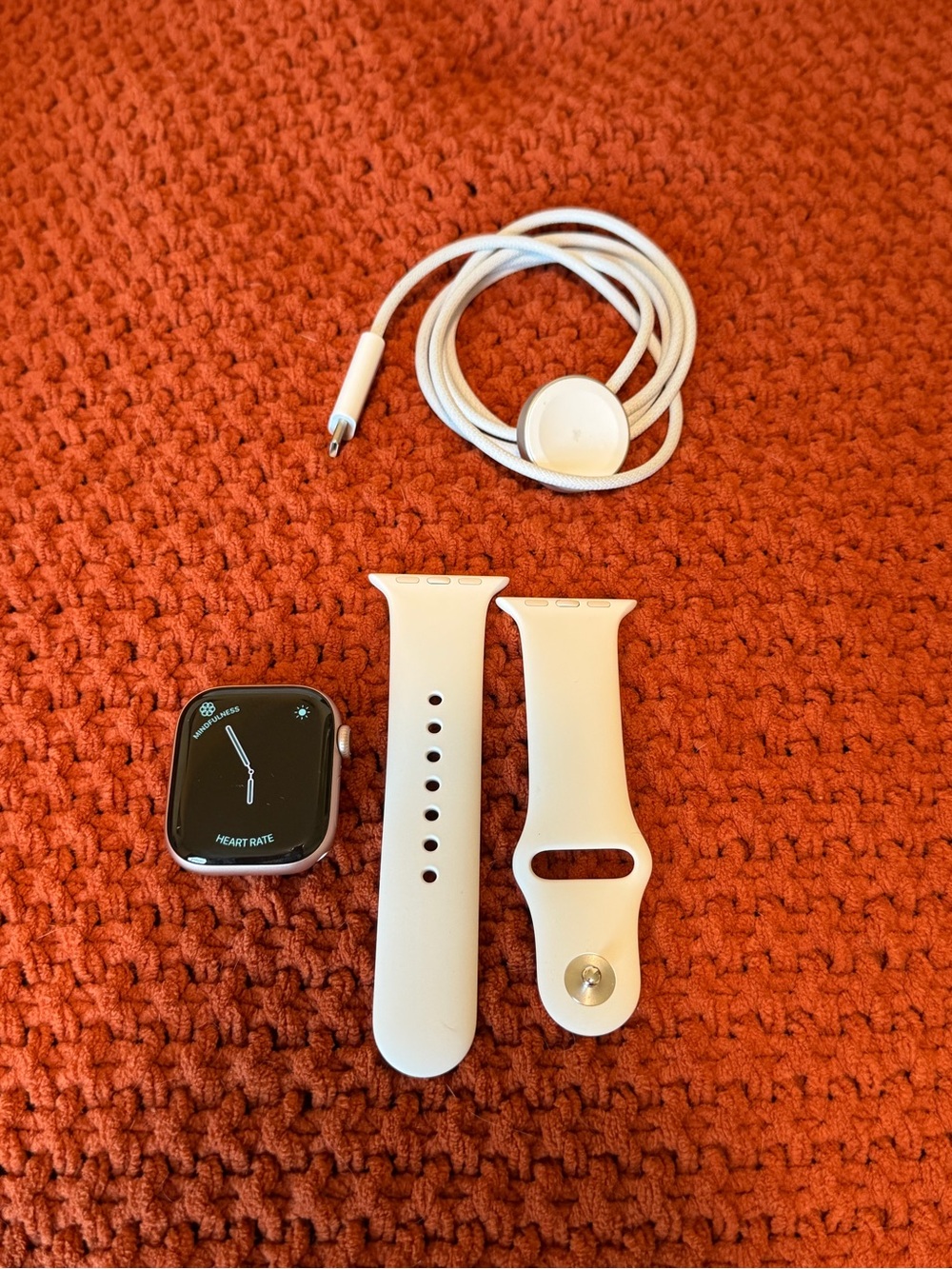 Apple Smartwatch with White Sport Band and White Charger Cable